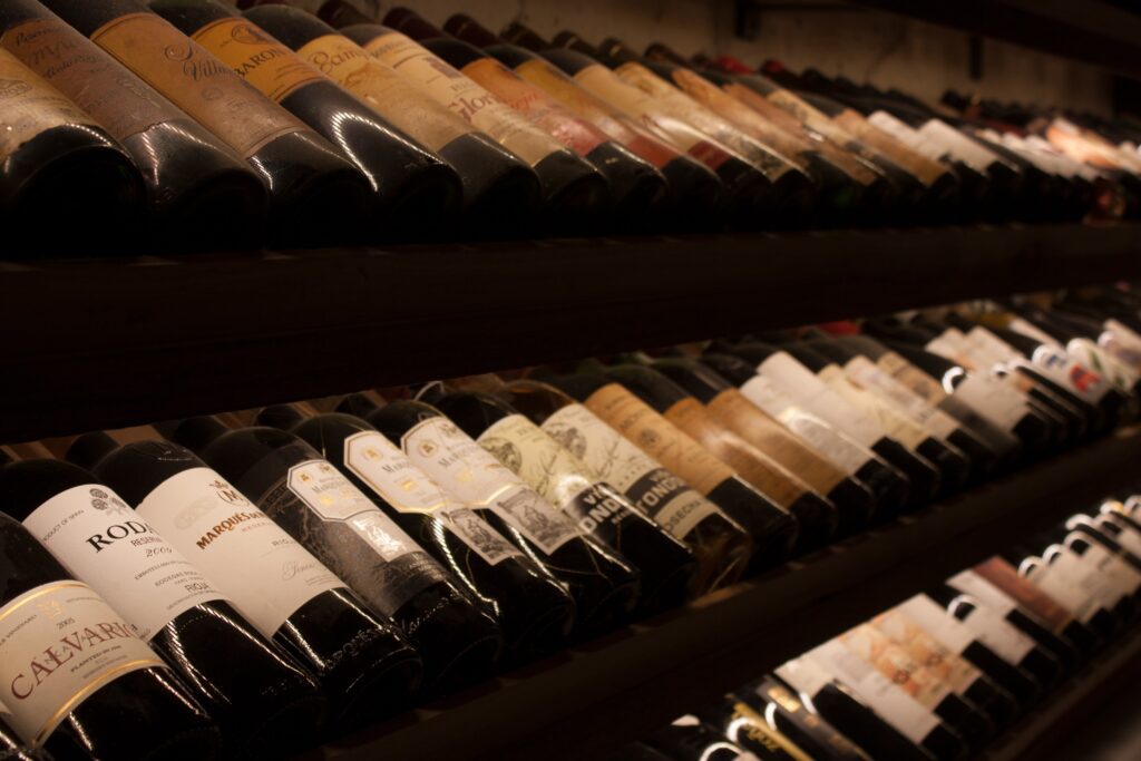 Bottles of wine in a dimly lit cellar