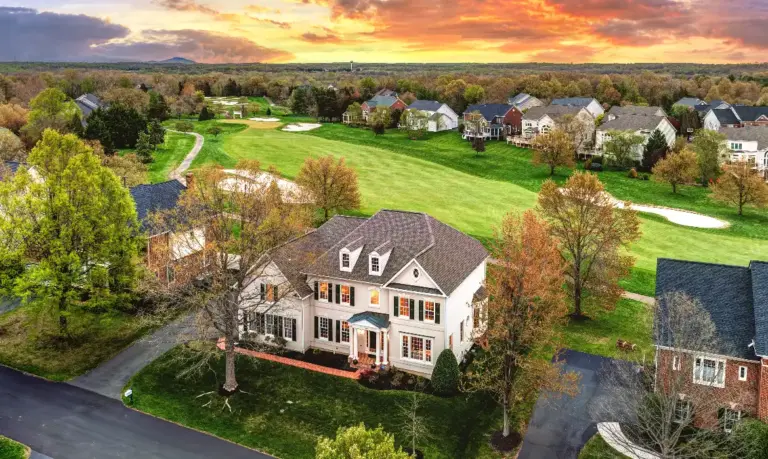 Aerial view of luxury Leesburg home backing to a golf course