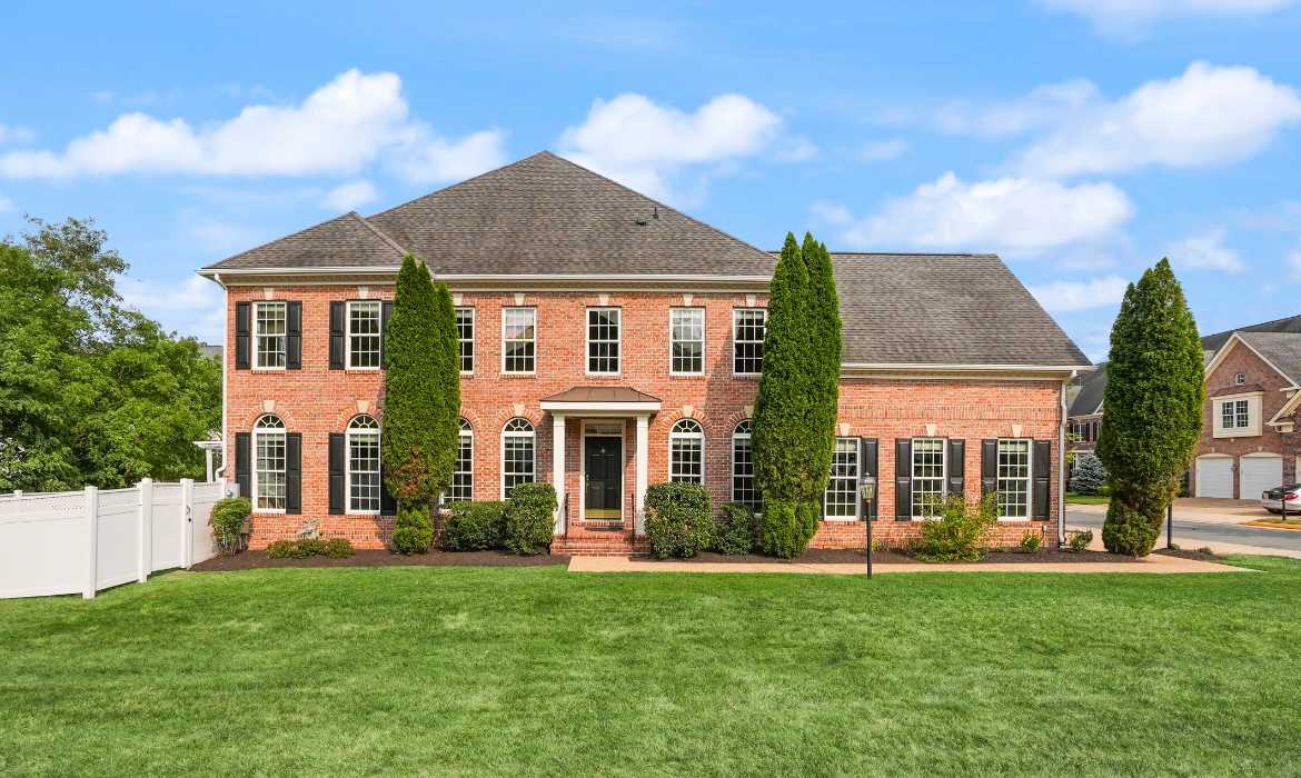 Luxury brick home sold by top Loudoun County realtor agents Jean Garrell Group, the best team to help you sell next year in 2026.