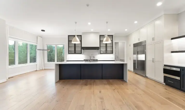 A vacant open-concept kitchen of a luxury real estate listing sold by top Loudoun County realtor Jean Garrell Group
