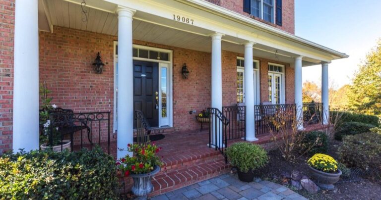 Brick front porch of a luxury home sold by Jean Garrell and the Garrell Group top Loudoun County real estate agents