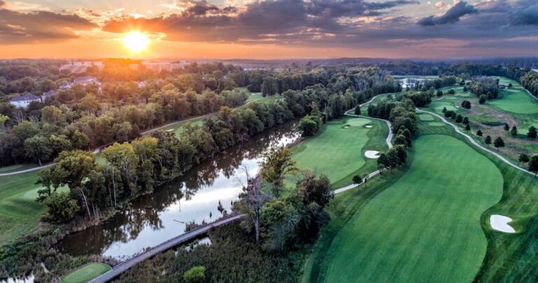 Aerial drone photo of a golf course in Lansdowne and Loudoun County, a top amenity for local home buyers.