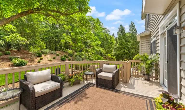 Backyard outdoor living area in the spring at a real estate listing by the best Leesburg and Ashburn realtor agents in Loudoun County, Jean Garrell Group