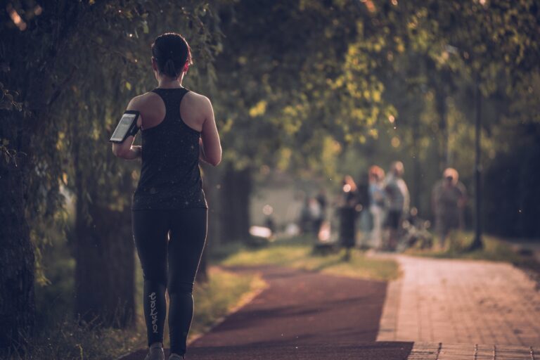 Runner on a nature path representing neighborhood running trails in Ashburn Virginia
