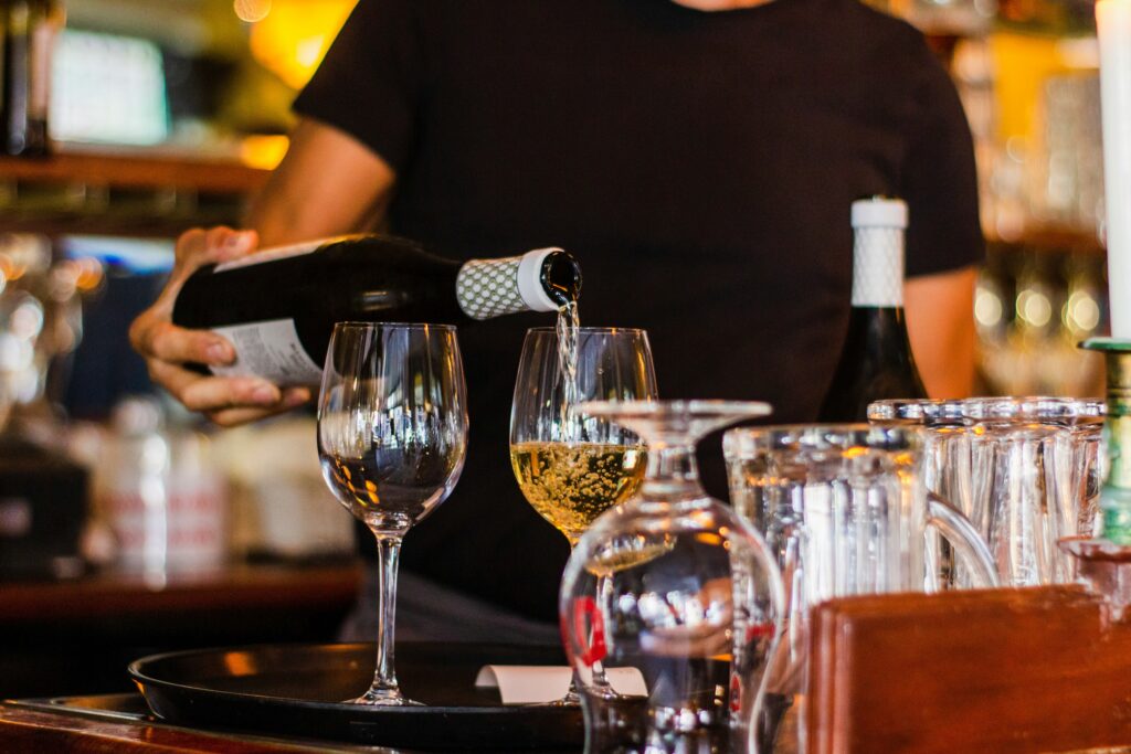 Wine being poured into a glass during a tasting near Purcellville, Virginia
