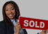 African American Agent Holding Sold Sign cover